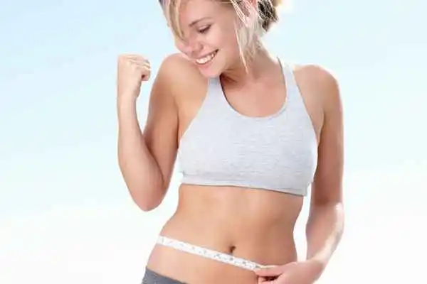 woman happy after fat reduction treatment West Sussex