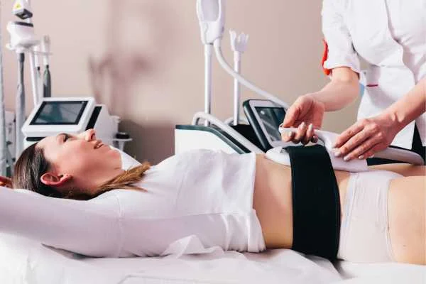woman having body sculpting to help improve her body image and her mental health West Sussex